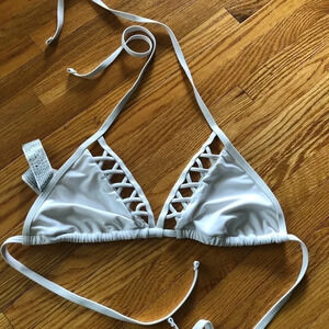 3 white bikini tops
